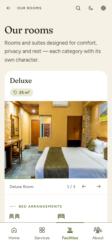 Rooms page showing the Deluxe room with size and photo gallery